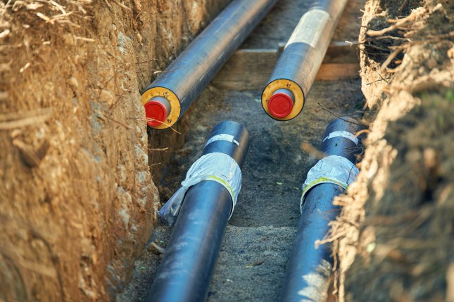 District heating - connecting insulated pipes District heating - connecting insulated pipes